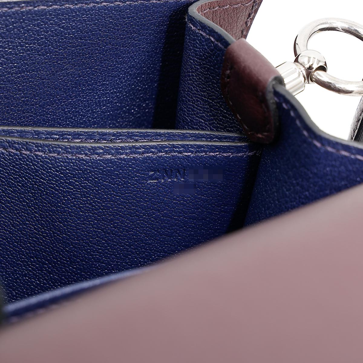 HERMÈS Verso Roulis Mini shoulder bag in Rouge Sellier Evercolor leather with Blue Marine interior and Palladium hardware - 25