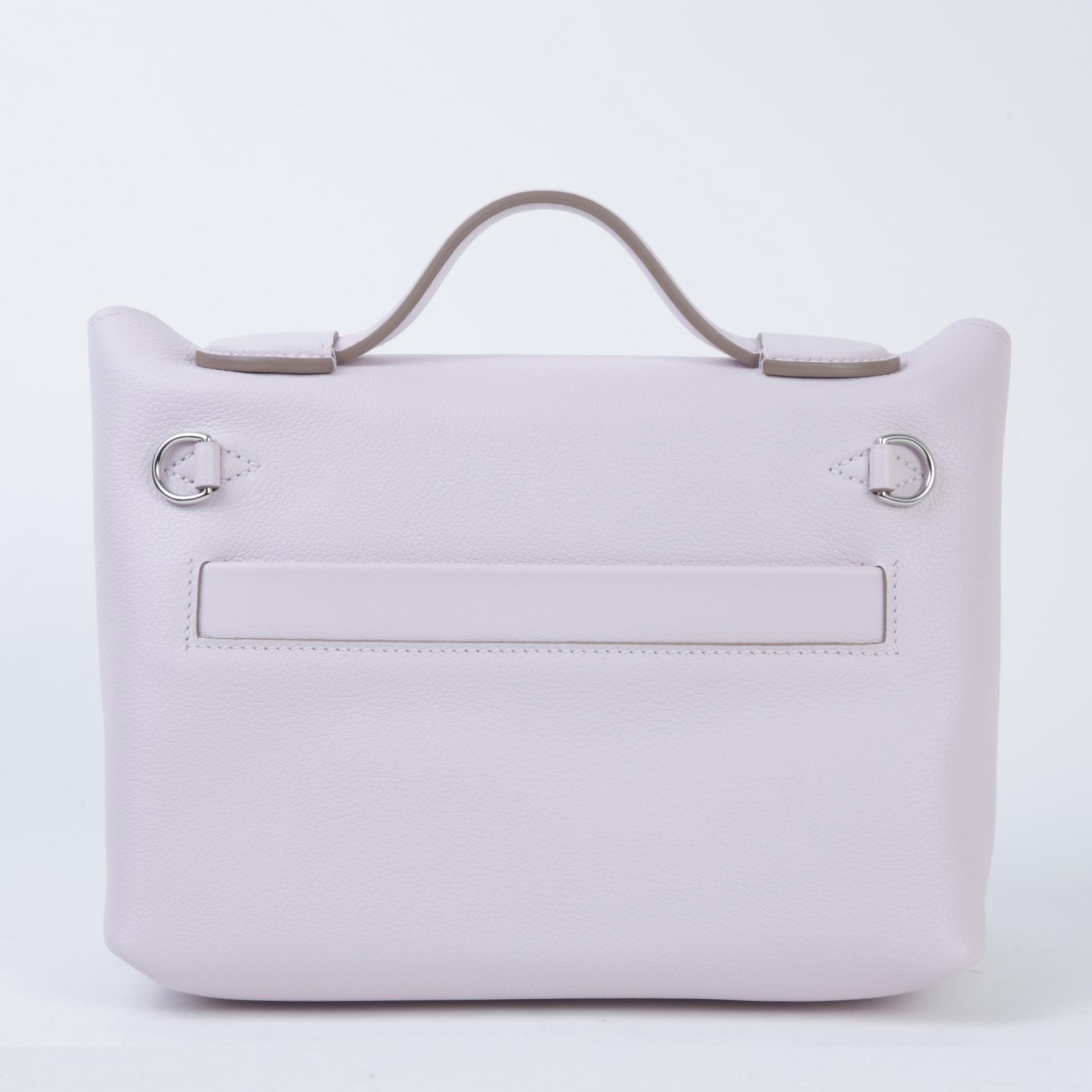 Unused ( Rank NS ) HERMÈS 24/24 - 21 mini Verso  Nata (I2) Mauve Pale (09) Evercolor Swift Palladium hardware B (2023) - 2