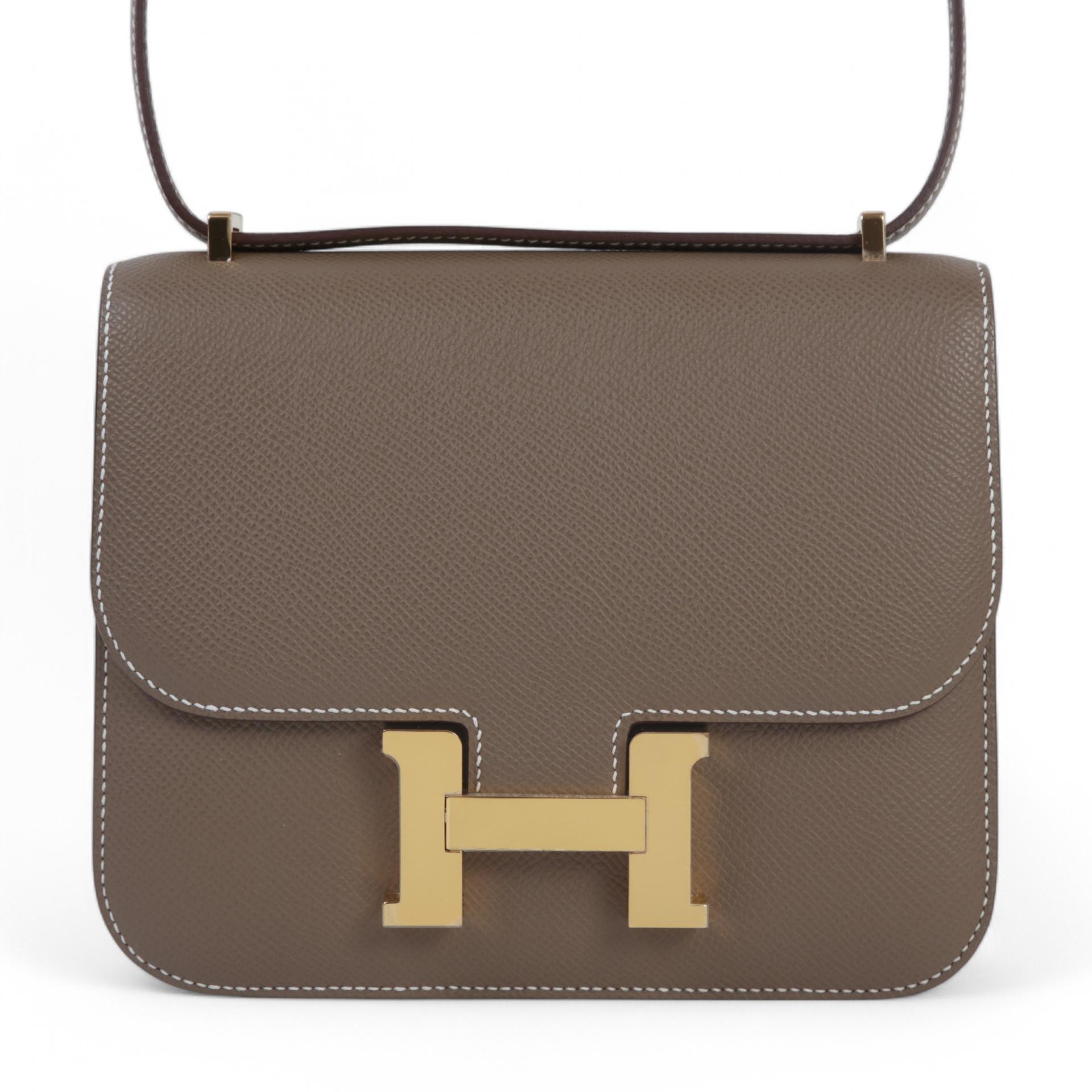Unused ( Rank NS )  HERMÈS  Constance Mini Etoupe (18) Epsom Gold hardware B (2023) - 1
