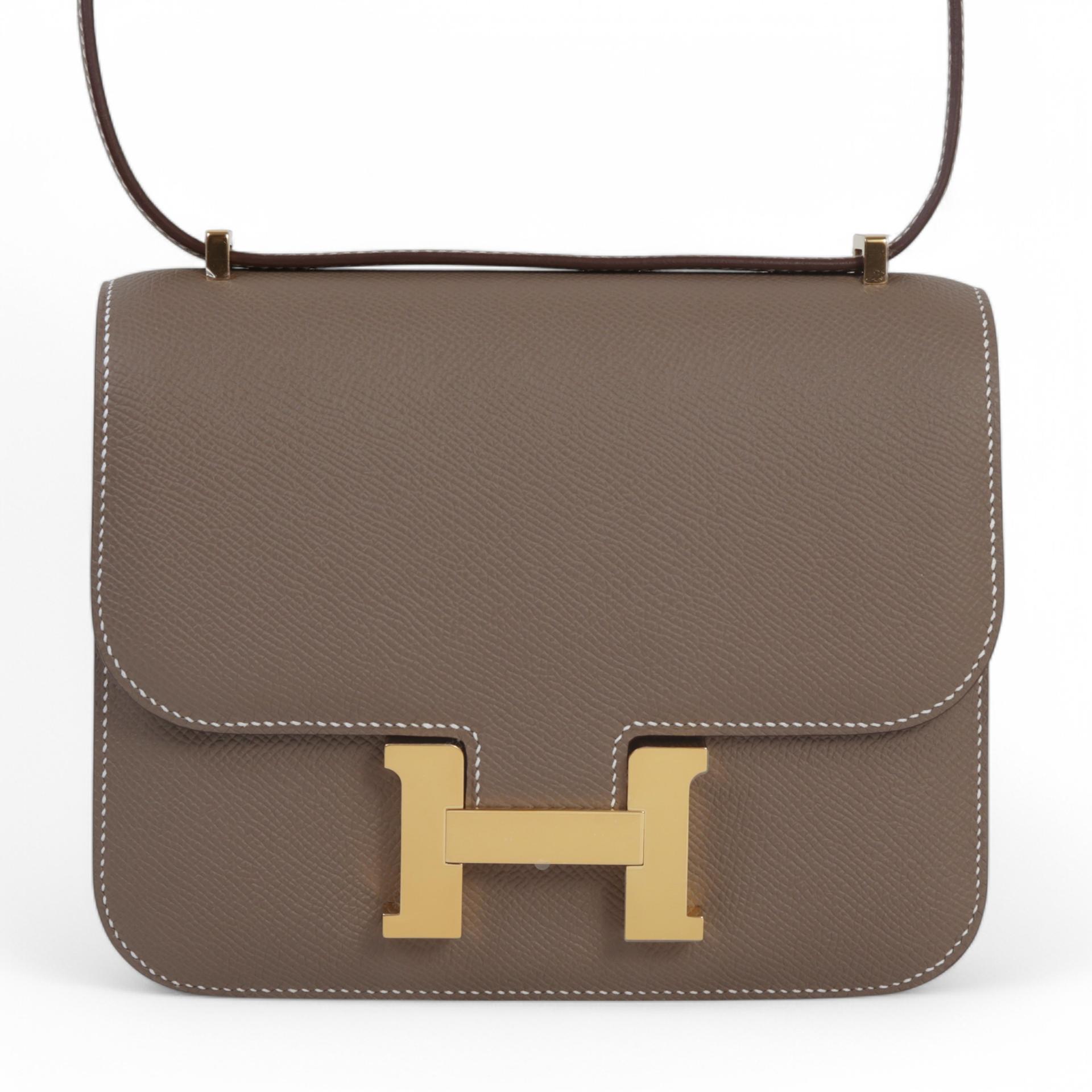 Unused ( Rank NS )  HERMÈS  Constance Mini Etoupe (18) Epsom Gold hardware B (2023) - 1