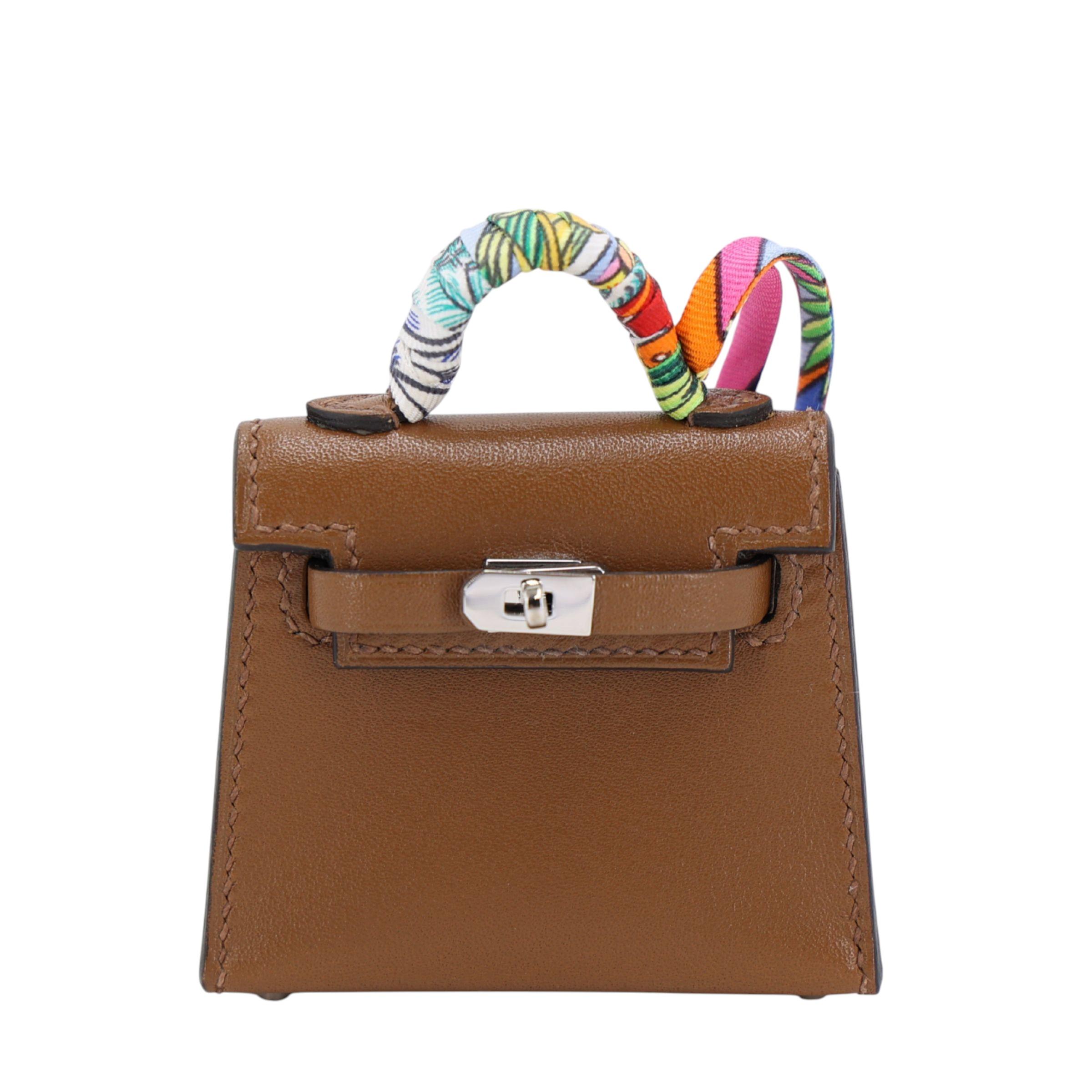 Excellent ( Rank SA ) HERMÈS Kelly Twilly charm Alezan (3G) Tadelakt Palladium hardware Z (2021) - 1