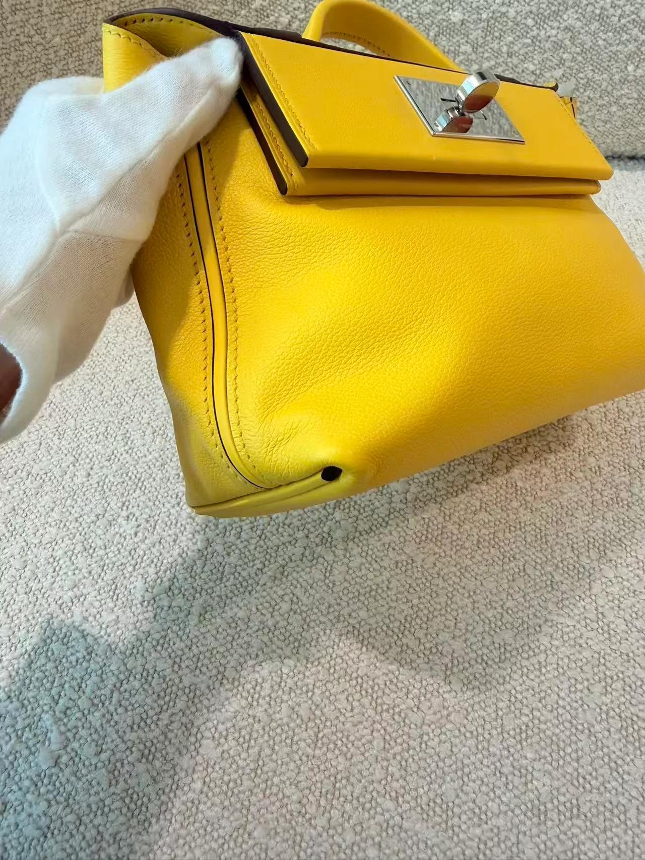 Very Good ( Rank A) HERMÈS 24/24 - 21 mini Jaune Ambre (9D) Evercolor Swift Palladium hardware U (2022) - 9
